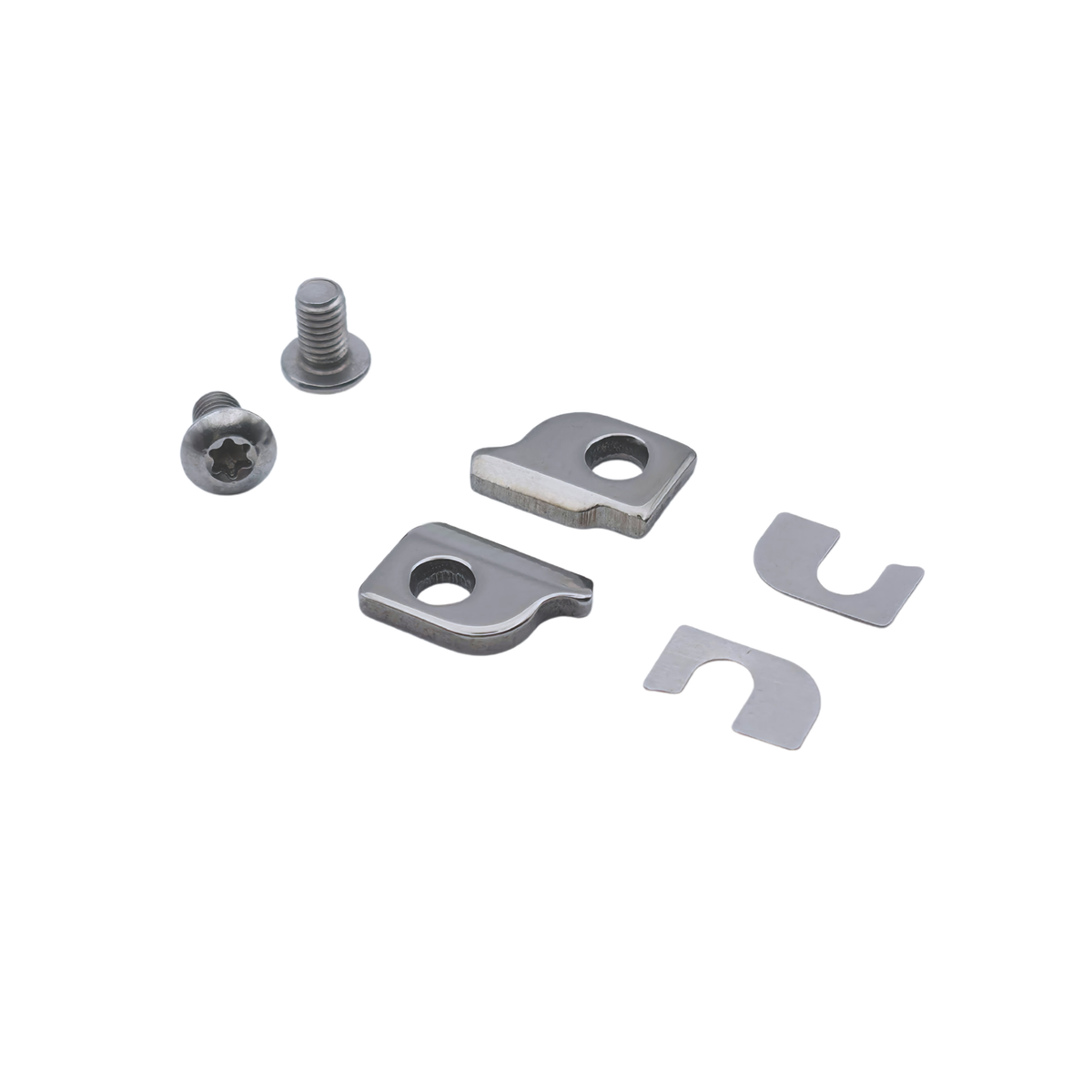 Set of metal brackets and screws on a white background