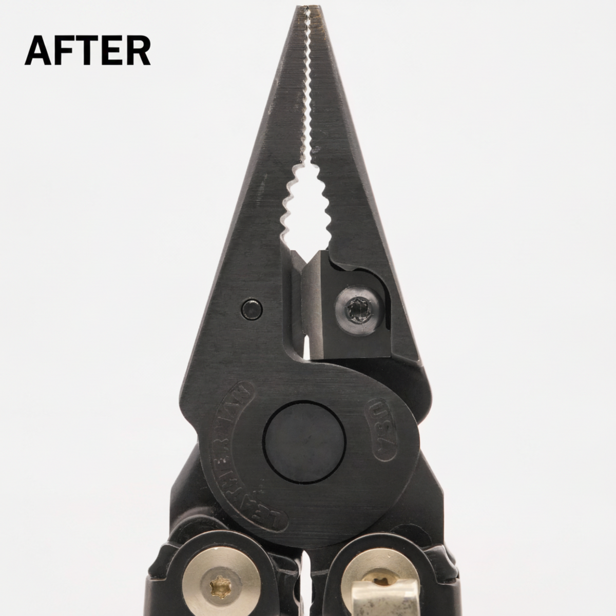 Close-up of a black multi-tool pliers with serrated teeth on the tip and silver metal screws, shown against a plain white background.