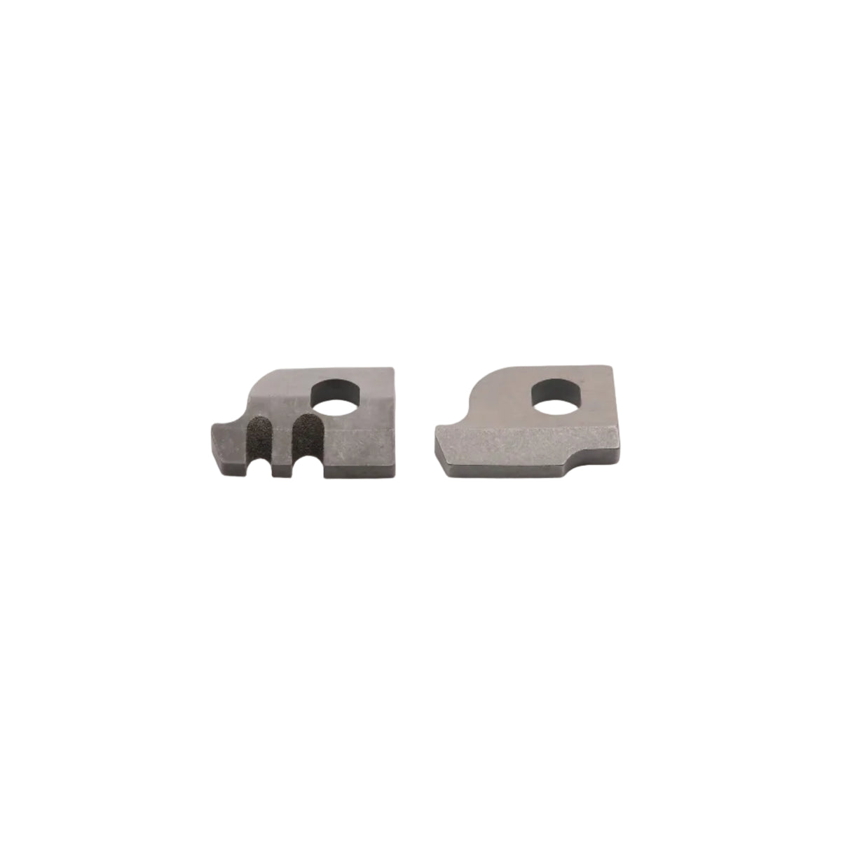 Cutter pieces with white centers on a white background