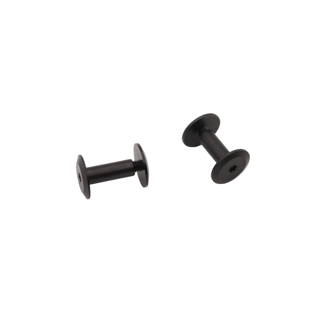 Two small black metal spool-shaped fasteners or hardware pieces on a plain white background.